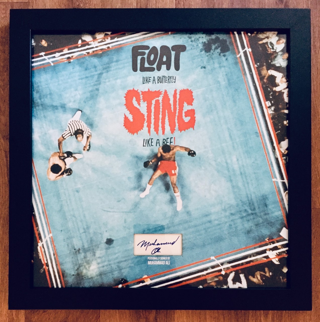 Muhammad Ali vs George Foreman "The Rumble in the Jungle" with a 1976 vintage autograph.